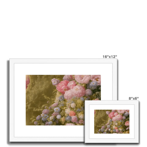 A large bouquet of colorful flowers in a picture frame with a white photo on a