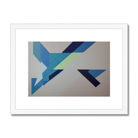 A blue and white art print with two different colored arrows on a red frame