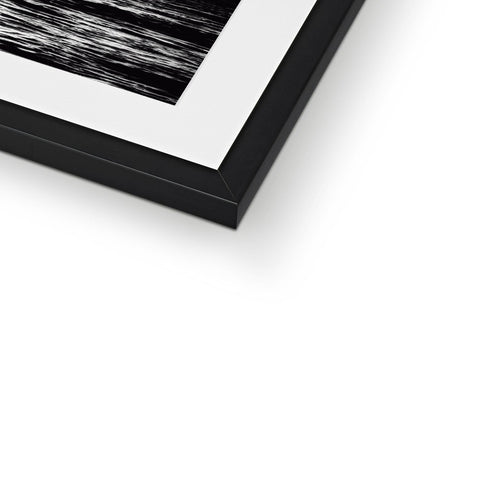 A close up of a black and white picture frame.