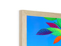 A picture frame that is seen on a shelf of wood and plastic.