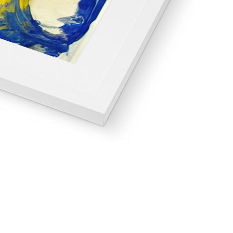 A picture of an abstract painting laying on a couch on a frame with a white background