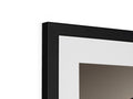 A framed photo of black and white picture frames up with the words “Art�