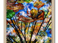 A paint stained glass frame filled with water lilies and large mushrooms