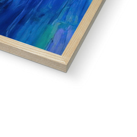 A wooden picture frame is in front of a painting with blue paint and yellow shading and