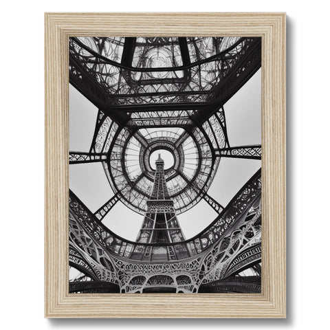 An art print with a picture of the Eiffel tower hanging on a wooden frame