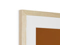 A piece of wood sitting in a frame on a white frame