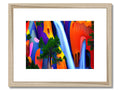 some colorful wood framed artwork in a river of vines and forest