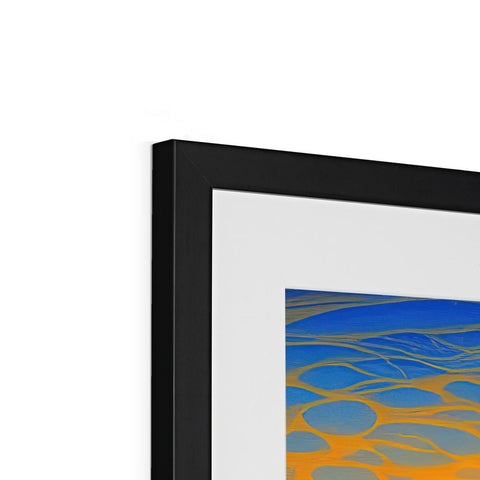 A black image of an abstract art print on a metal frame next to a blue mirror