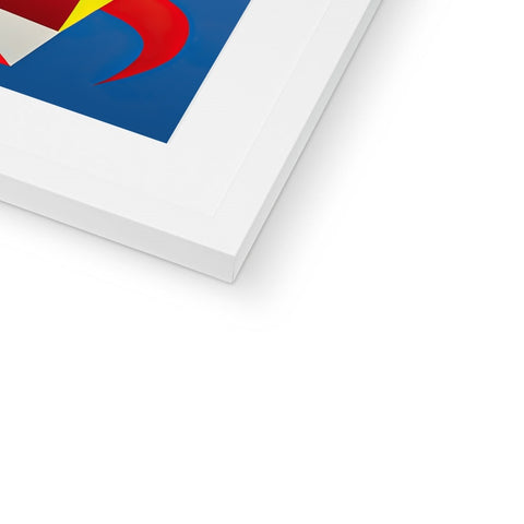 A close up of a small book next to a red and blue picture.