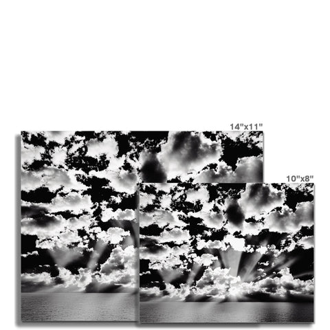 Two black and white photos on a book cover with several clouds.