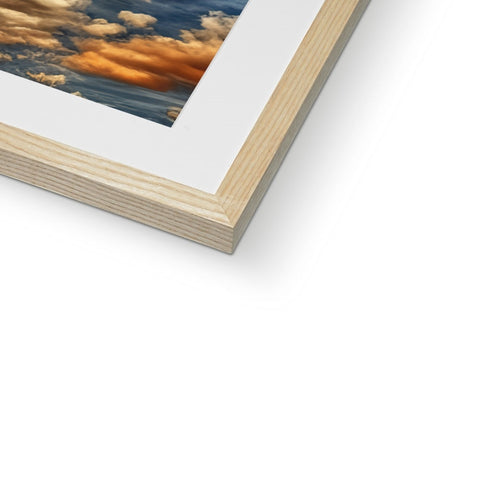 A small white picture of a wooden frame with a picture on it.