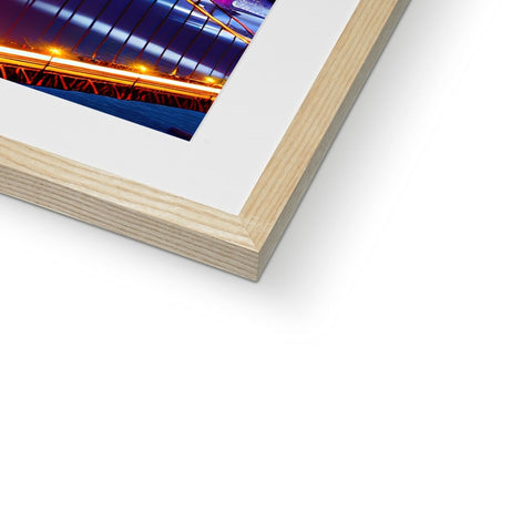 An image of a picture inside of a beautiful wooden framed photo frame with a light blue
