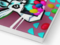 A colorful printed art book filled with stickers on a wooden card board filled with various different