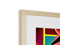 A picture of a red and blue sculpture is hanging in a wooden frame.