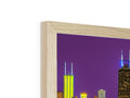 A photo frame with an image of Chicago and the skyline in it on a white wooden