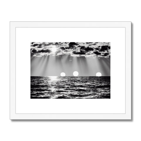 A black and white art print of some beach scenes with water out.