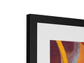 A picture frame containing a hanging picture of an abstract art piece.