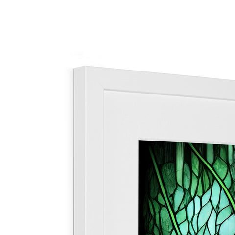 A picture frame with a green window on a screen in front of a wall.