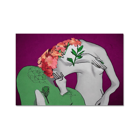 Two women embracing and kissing in front of a couple of plants.