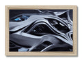 A frame that is holding an abstract art painting on a wooden shelf.
