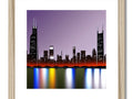 An art print of a skyline and city skyline with light and colors.