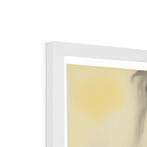 A light yellow painting on a photo glass next to a black picture frame.