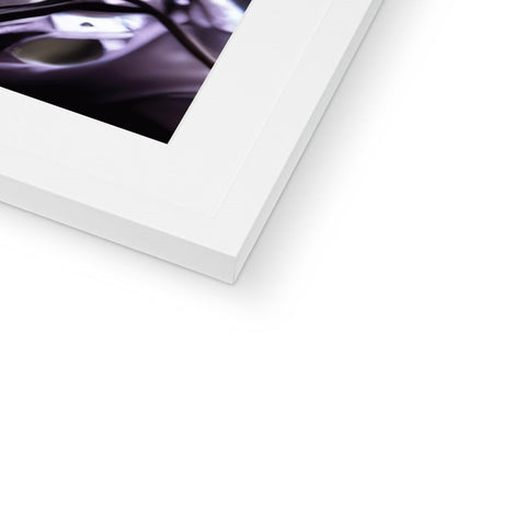 A picture of a white photo of a car frame in a book.