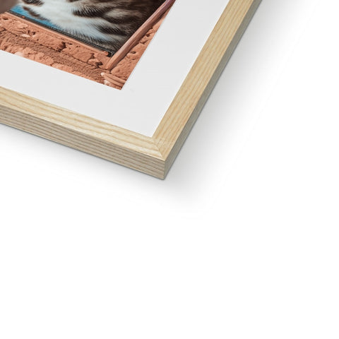 A book with photos of animals on it on a wooden frame.
