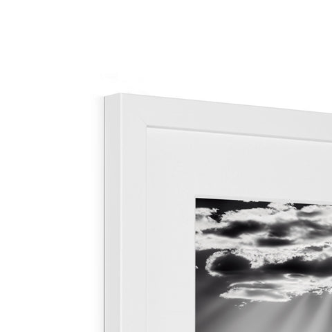 A white image of a window on a flat black and white picture frame.