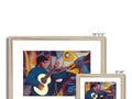 A picture frame with two paintings and a picture of a guitar playing with one hand.