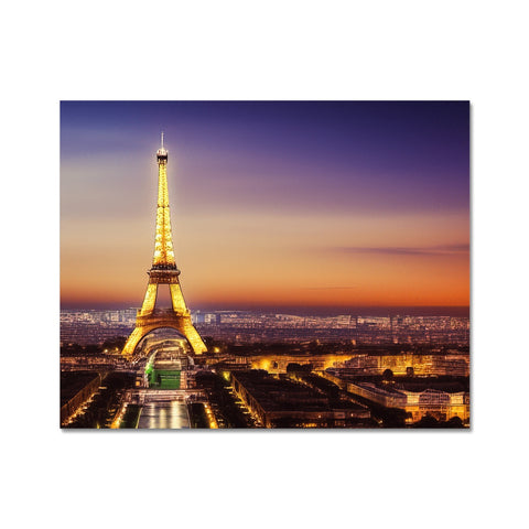 An art print painting of the Eiffel tower and a place mat placed on a