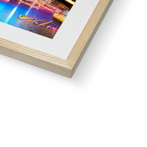 A frame containing a photograph of a picture on a photo book.