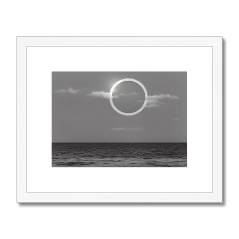 An art print of the moon hovering high above the ocean.