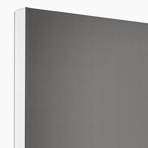 A picture of a stainless steel fridge with the top off on it hanging off a wall