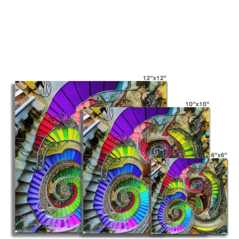 An image of a spiral table with two of different colors under the picture of a staircase