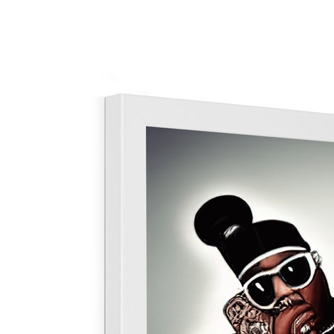 An ice cube sitting on top of a picture framed on a white frame.