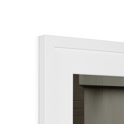 A kitchen door that is on a white wall with a white cabinet.