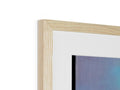 A white painting on wood frame sitting next to a large blue picture of a photo on