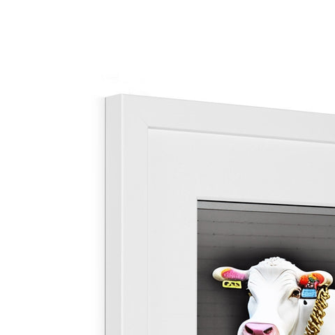 A cow looking down at a clock, on a refrigerator and refrigerator magnets 