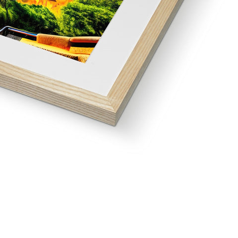 A picture of a wood frame sits alongside a book in a book.
