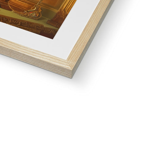 A picture is framed inside the frame of a tall wooden bowl with a gold background.