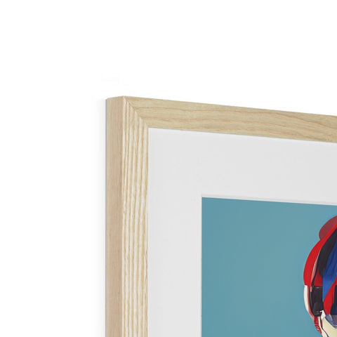A big photo of artwork in a picture frame on top of an object.