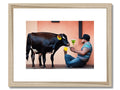 A cow and other grazing animal looking at an art print
