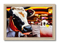 A cow has its head on top of a wooden framed wooden frame with a wooden object