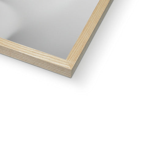 a mirror shows pictures of wood frames on a white background