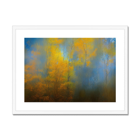 A wood framed picture of a white and yellow birch tree and apple trees and a
