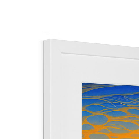 A colorful art print with a sunburst on a picture frame in front of it.