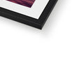 A picture frame with a close up of a photograph sitting on top of a black background