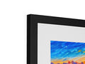 A picture frame with colorful art prints of the ocean on it's underside.