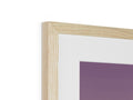 A white picture frame that stands next to wooden frame with wood on top.